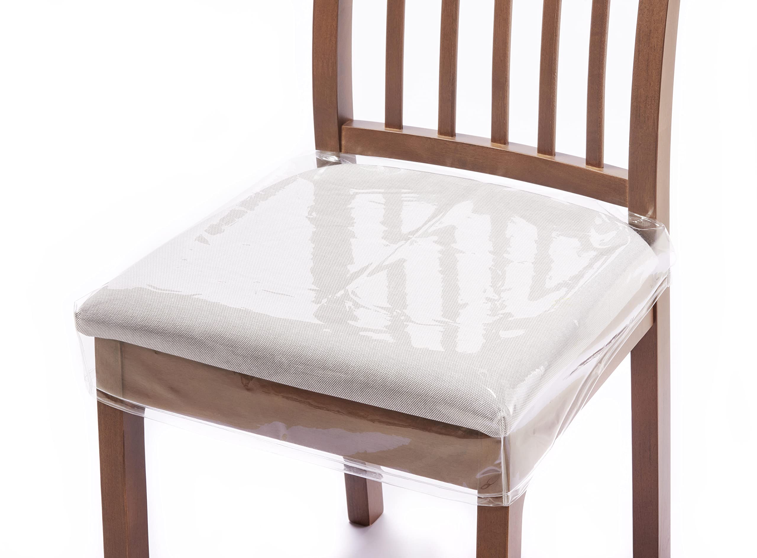 Ridgesun clear chair slipcover over a dining chair protects surface while preserving chair design.