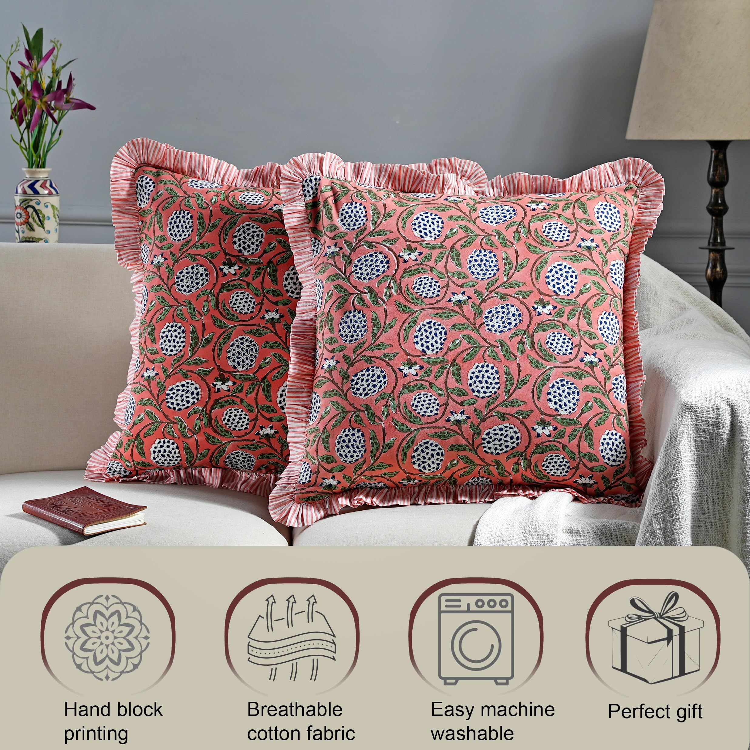 Ridhi block print dark salmon pink 18x18 on sofa adds vibrant accent.