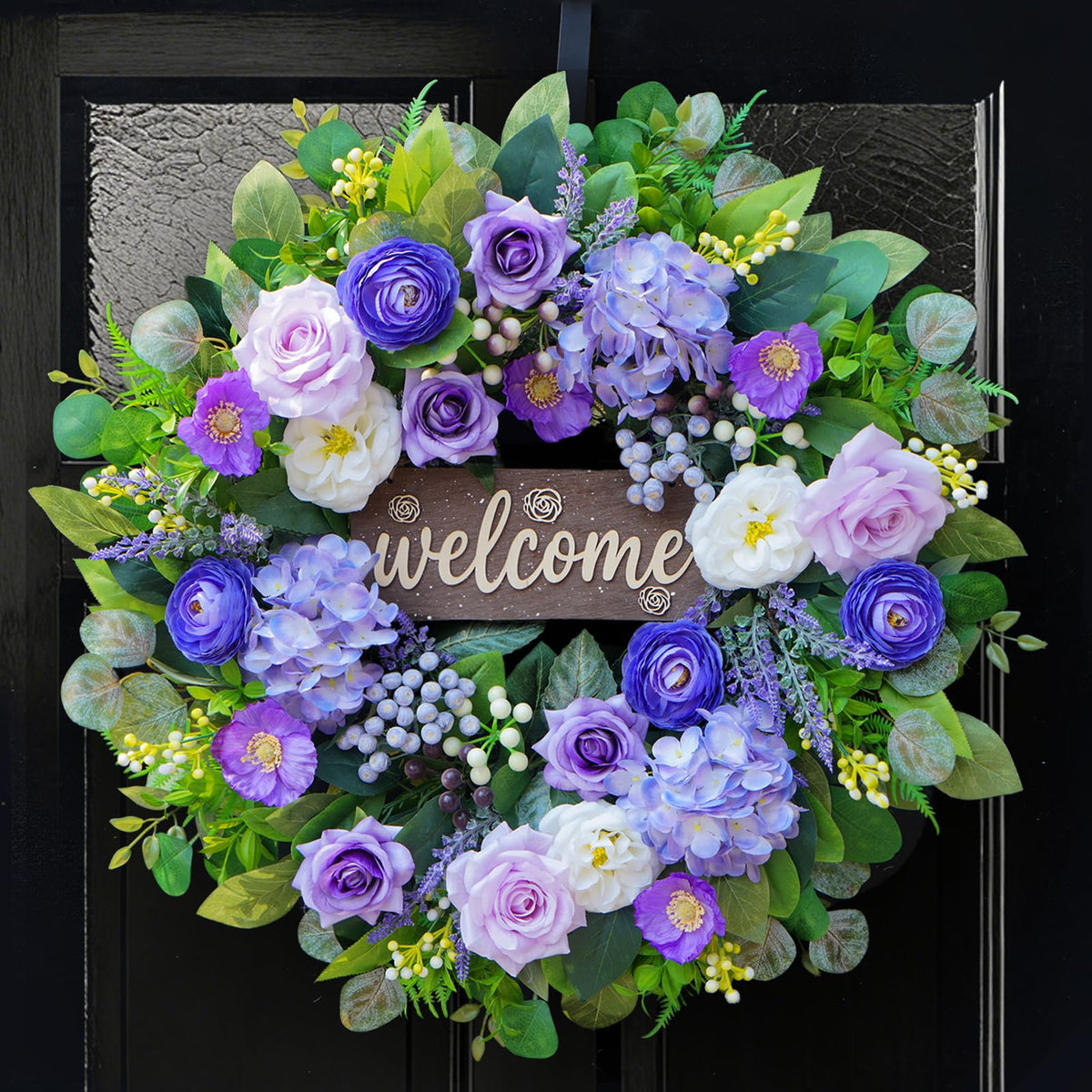 Rimalo 24-inch wreath with lavender blooms greeting guests at the front door