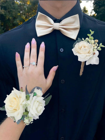Rinlong corsage-boutonniere set with white roses and sage greenery for timeless elegance.
