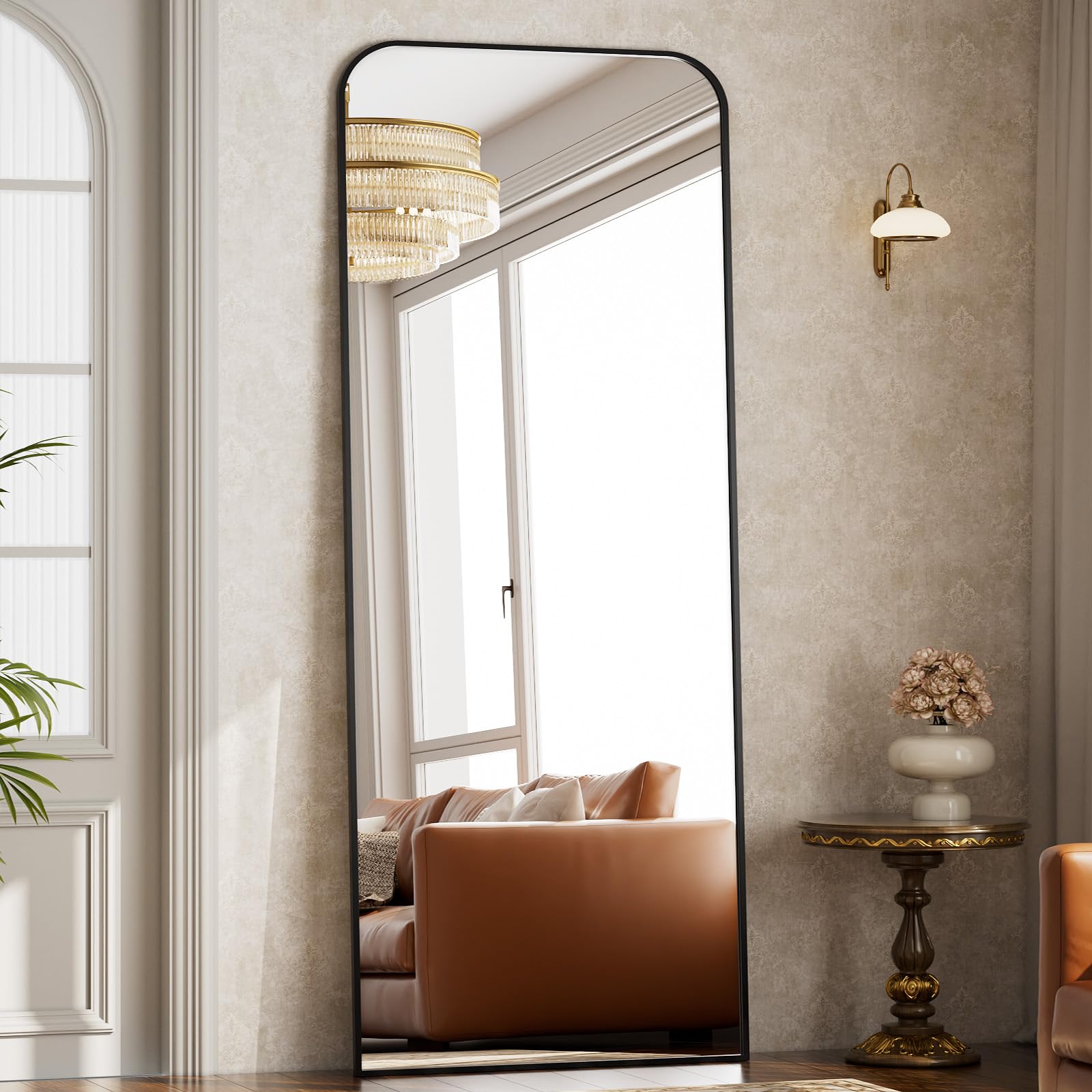 Riskioir bedroom setup shows how the mirror brightens and enlarges space.