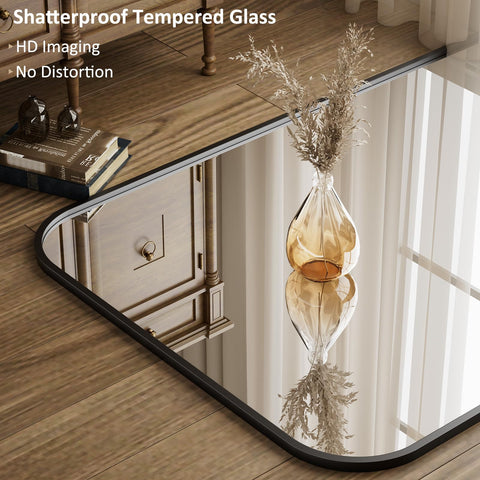 Riskioir freestanding mirror with reinforced base stays stable without drilling.