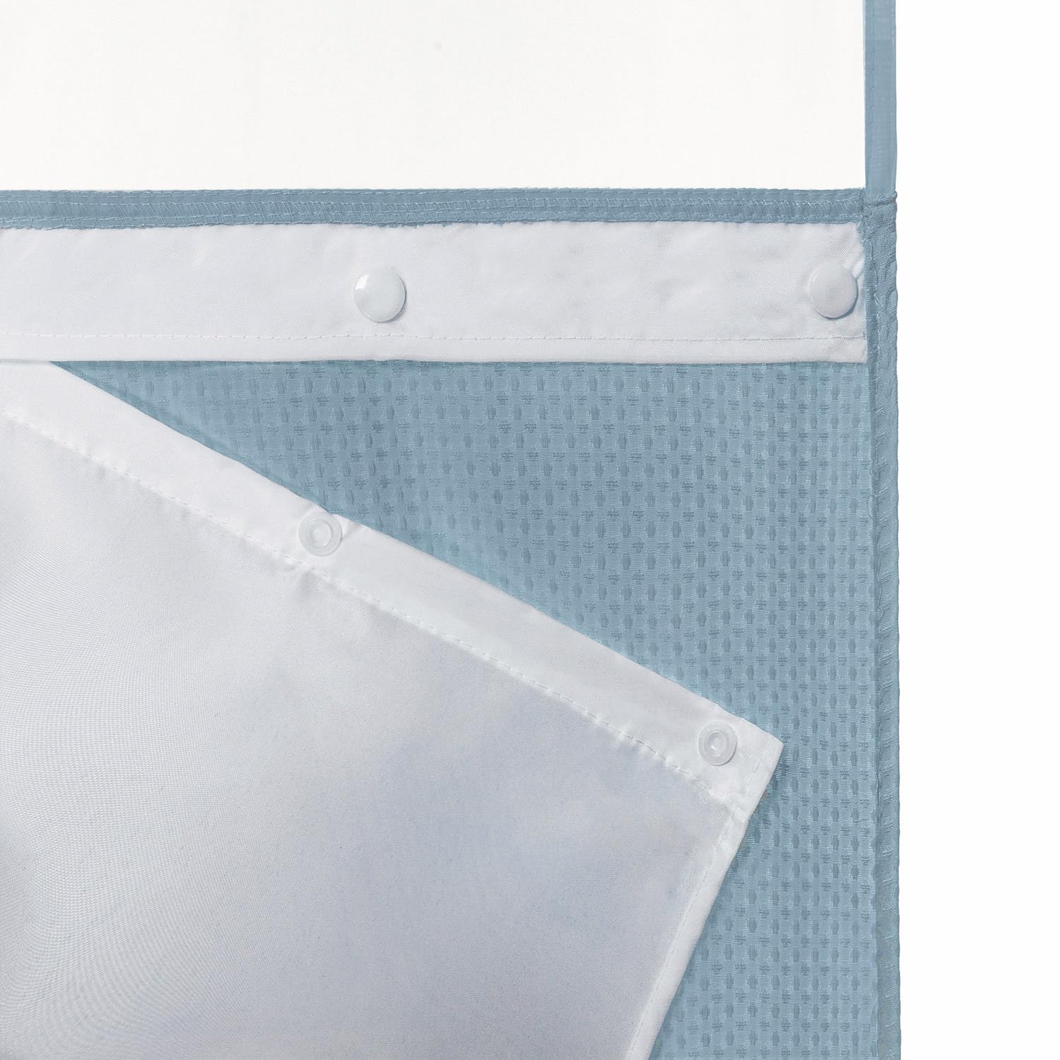 River Dream dotted weave curtain with split rings for easy installation.