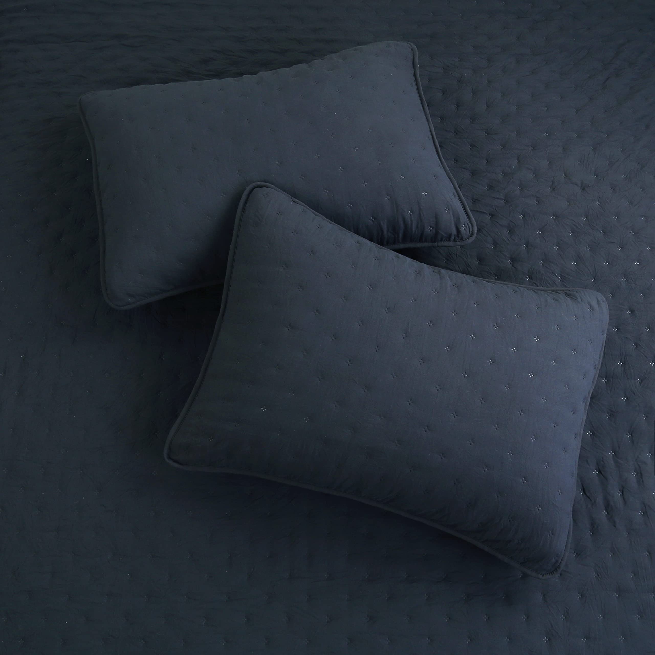 ROARINGWILD all-season sleep setup shown in a layered bed arrangement