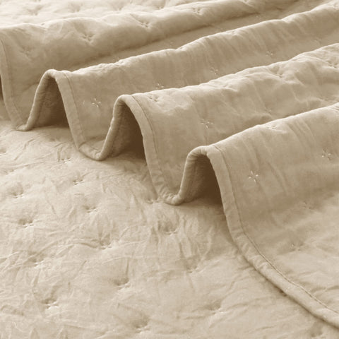 ROARINGWILD farmhouse-style bedroom with quilt layered for lightweight warmth.
