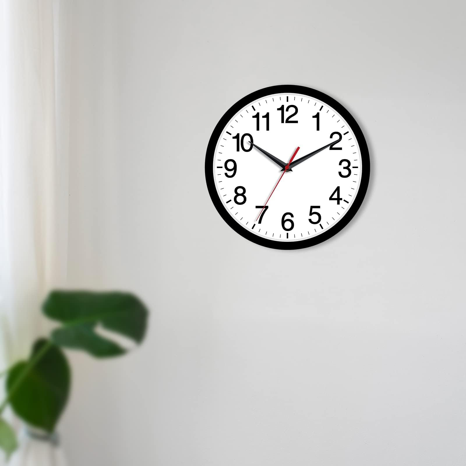 Rohioue clock on office wall complements workspace with clear time.