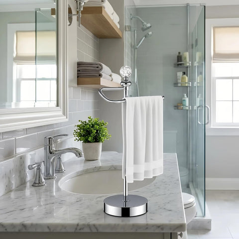 ROLABAM crystal-top towel holder blends with chrome fixtures for modern decor.