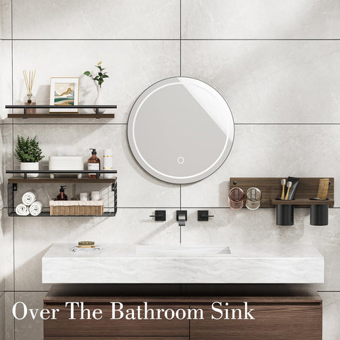 RoleDes wall-mounted wood shelves over the toilet save counter space and add rustic charm