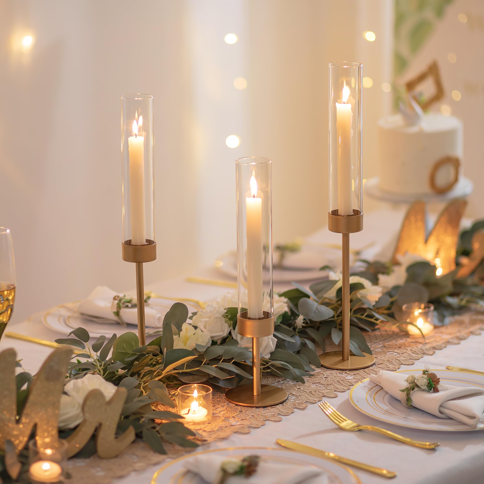 Romadedi gold taper candlestick holders with varied heights for dramatic display