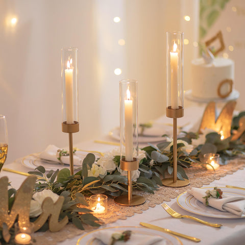 Romadedi gold taper candlestick holders with varied heights for dramatic display