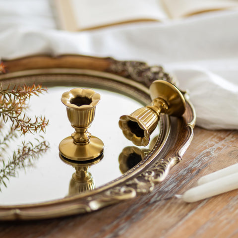 Romadedi brass candlestick holders add warm ambience to mantel displays and holidays