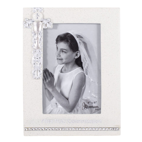 Roman Communion Frame Silver 8-inch elegantly displays a 4x6 photo in a sacred space.