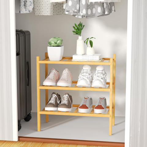ROMGUAR CRAFT 3-tier bamboo shoe rack in closet, durable bamboo construction.