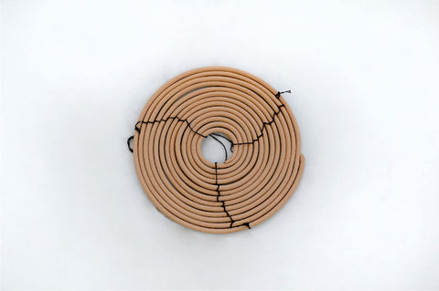 Rool citronella coil 6-inch diameter adds decorative scent touch.
