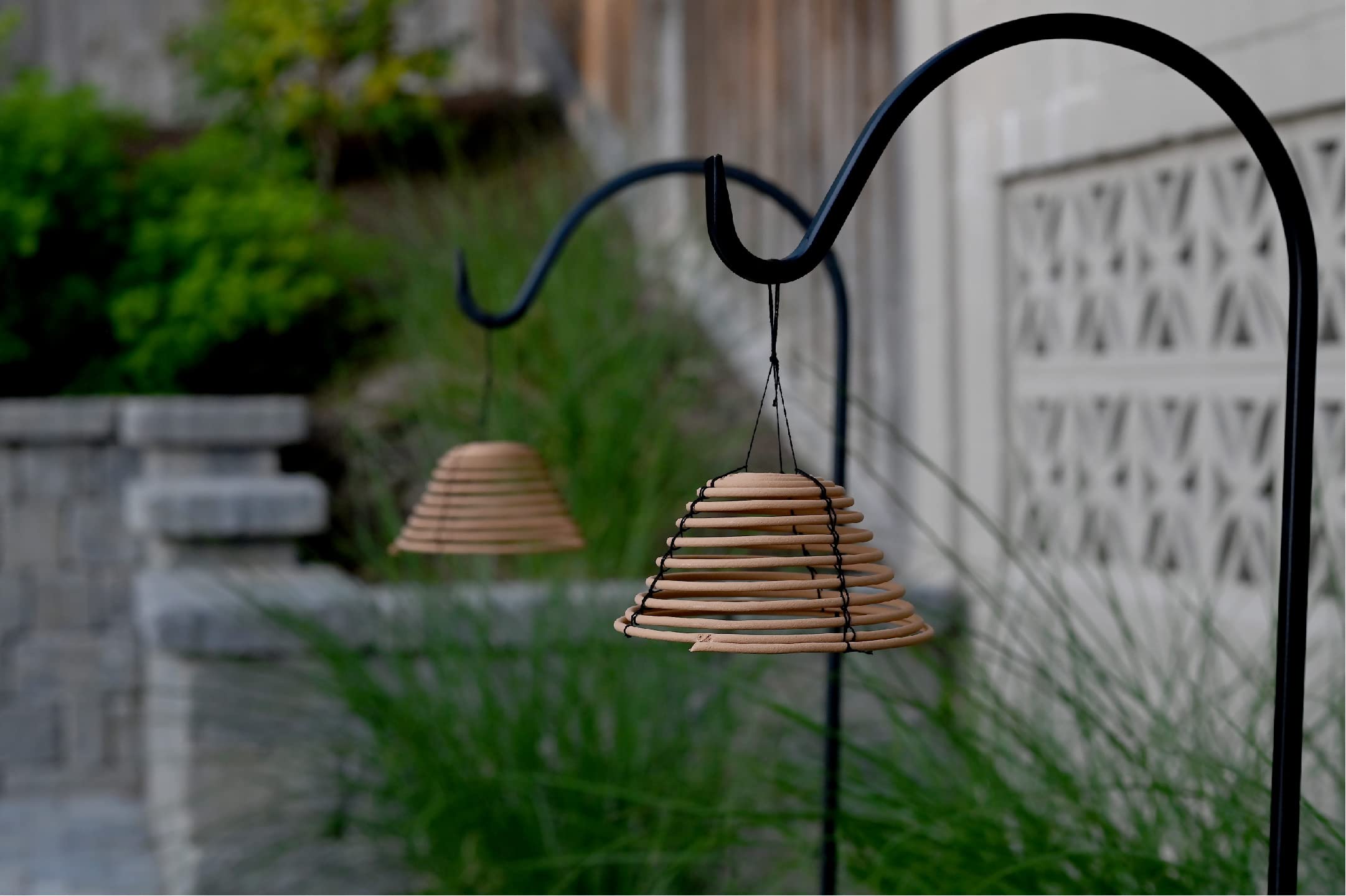 Rool citronella coil in backyard ambience enhances outdoor meals.