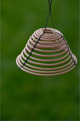 Rool citronella coil black wrap design keeps coil shape stylishly.