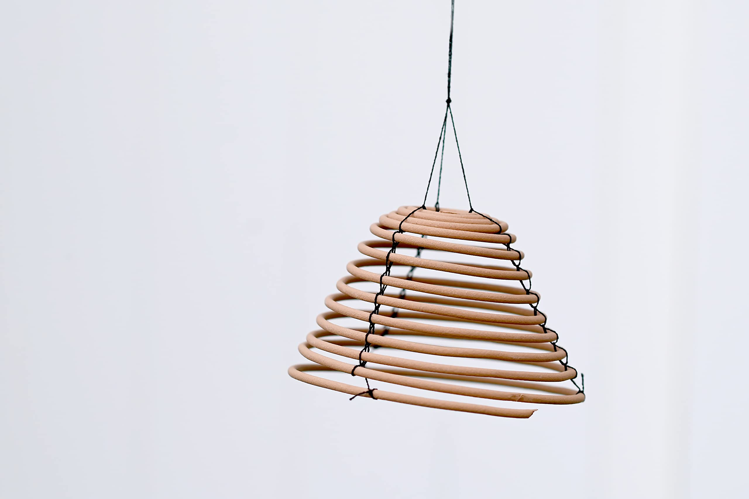 Rool citronella coil for camping use provides portable outdoor aroma.