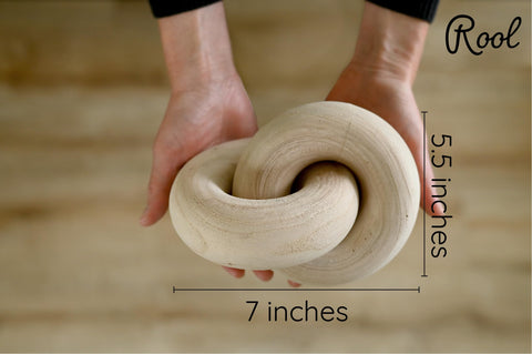 Rool living room decor wood knots create a stylish minimalist centerpiece.