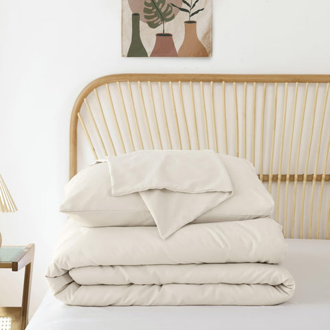 ROSGONIA beige comforter in room setting showcases versatile styling