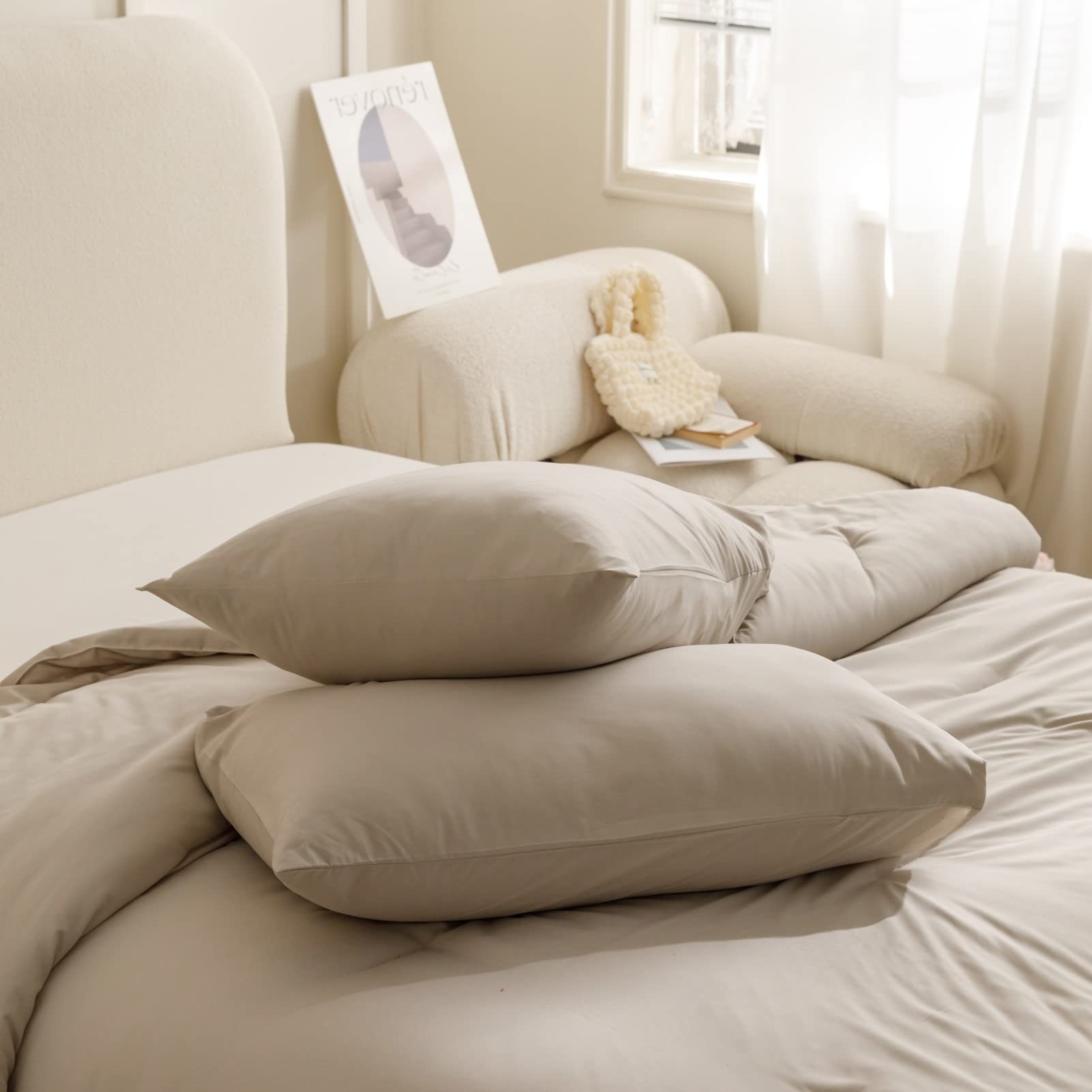 neutral oatmeal tones from rosgonia create calming, versatile bedding decor