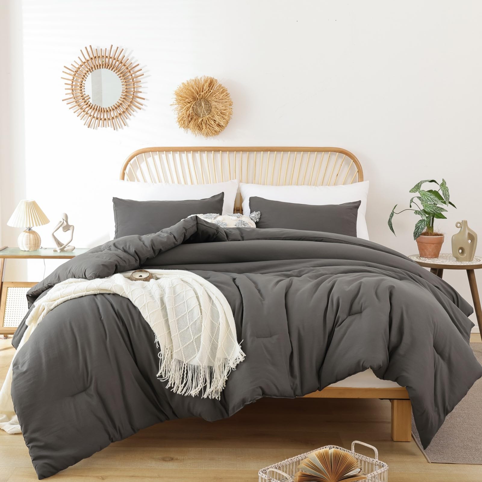 ROSGONIA queen comforter set in charcoal gray on a cozy bed for all-season warmth