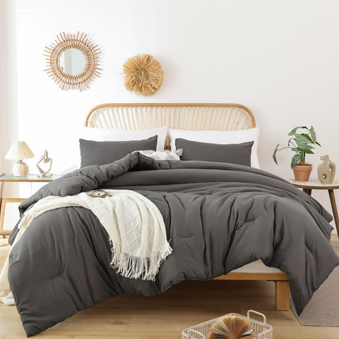 ROSGONIA queen comforter set in charcoal gray on a cozy bed for all-season warmth