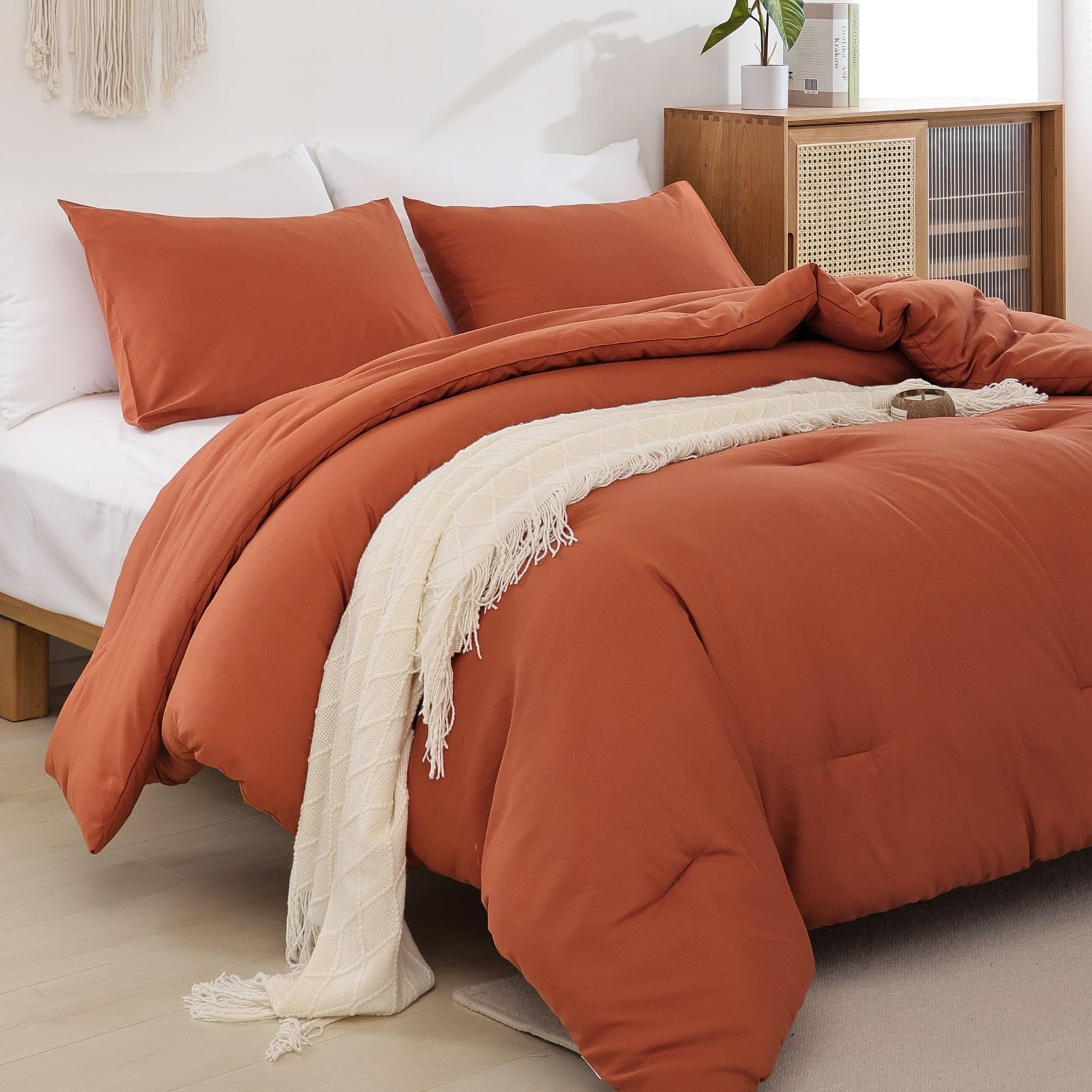 ROSGONIA terracotta comforter texture close-up showcases soft, lightweight fabric quality.