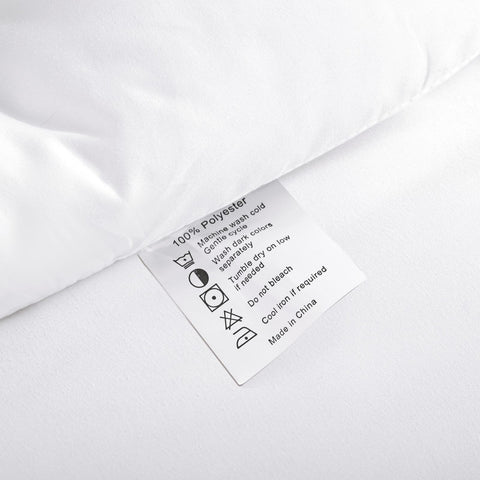 ROSGONIA white queen comforter room scene shows versatile, timeless decor.