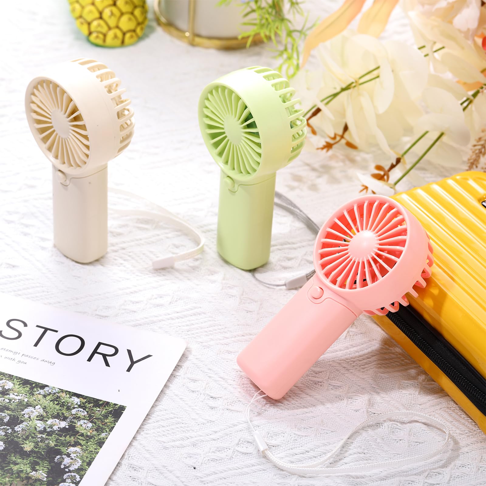 Rossesay AAA-powered handheld fan keeps you cool between activities.