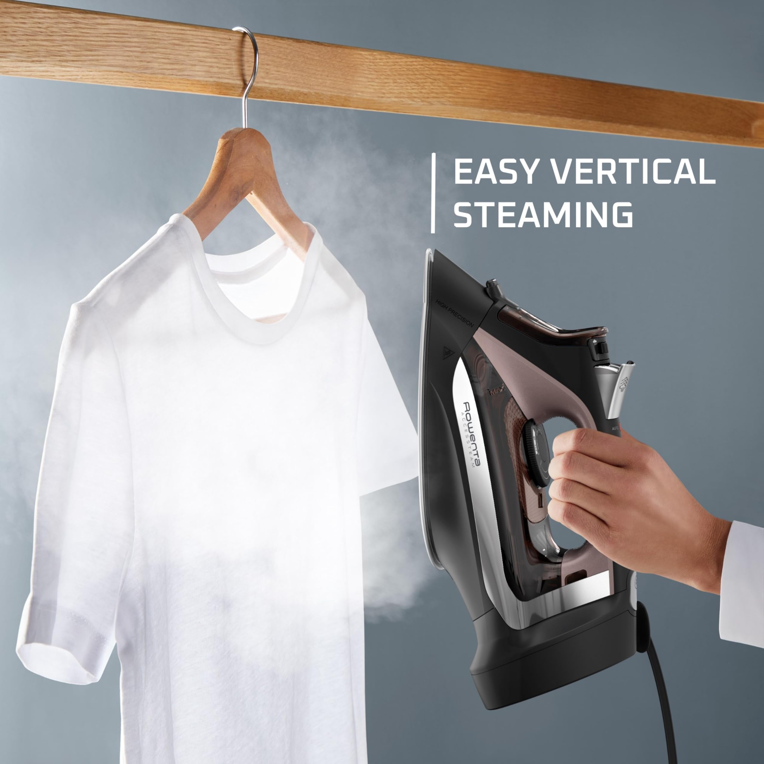 Rowenta AccessSteam Cordreel vertical steaming shown for garments and curtains.