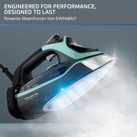 Rowenta Steam Force microsteam hole architecture captured mid-ironing for even steam distribution and crease relief.