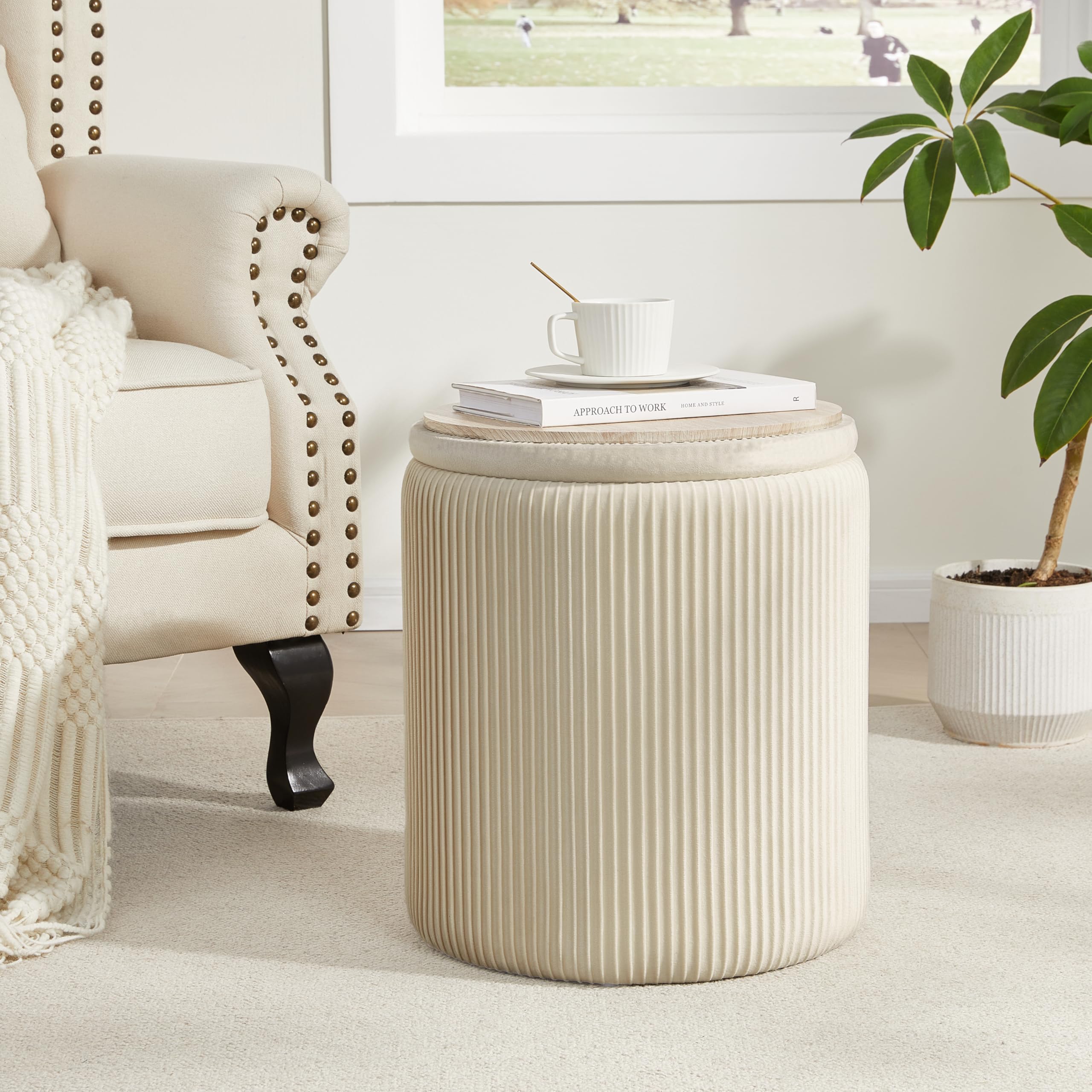 Beige velvet ottoman by Royal Windsor adds soft seating and hidden storage.