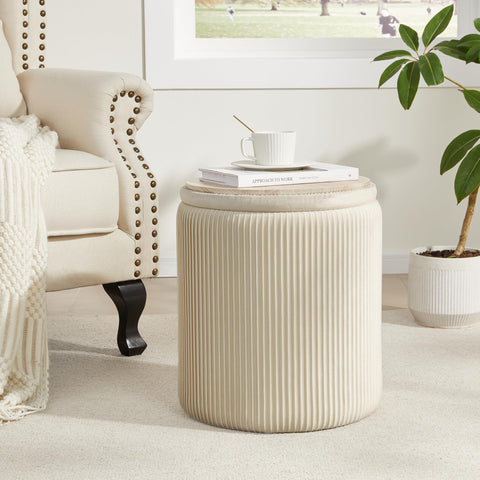 Beige velvet ottoman by Royal Windsor adds soft seating and hidden storage.