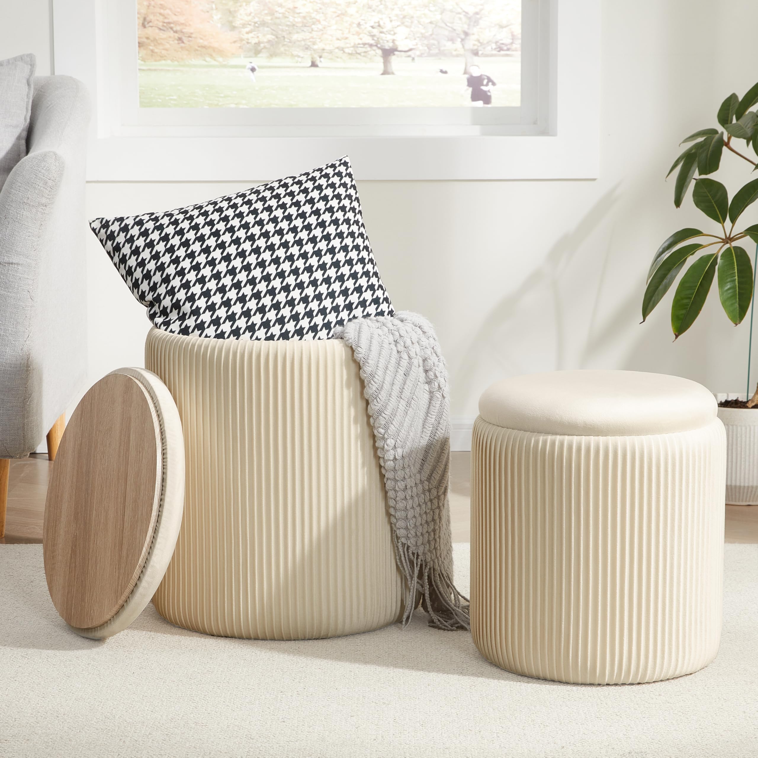 Royal Windsor round storage ottoman set of two demonstrates space-saving design.