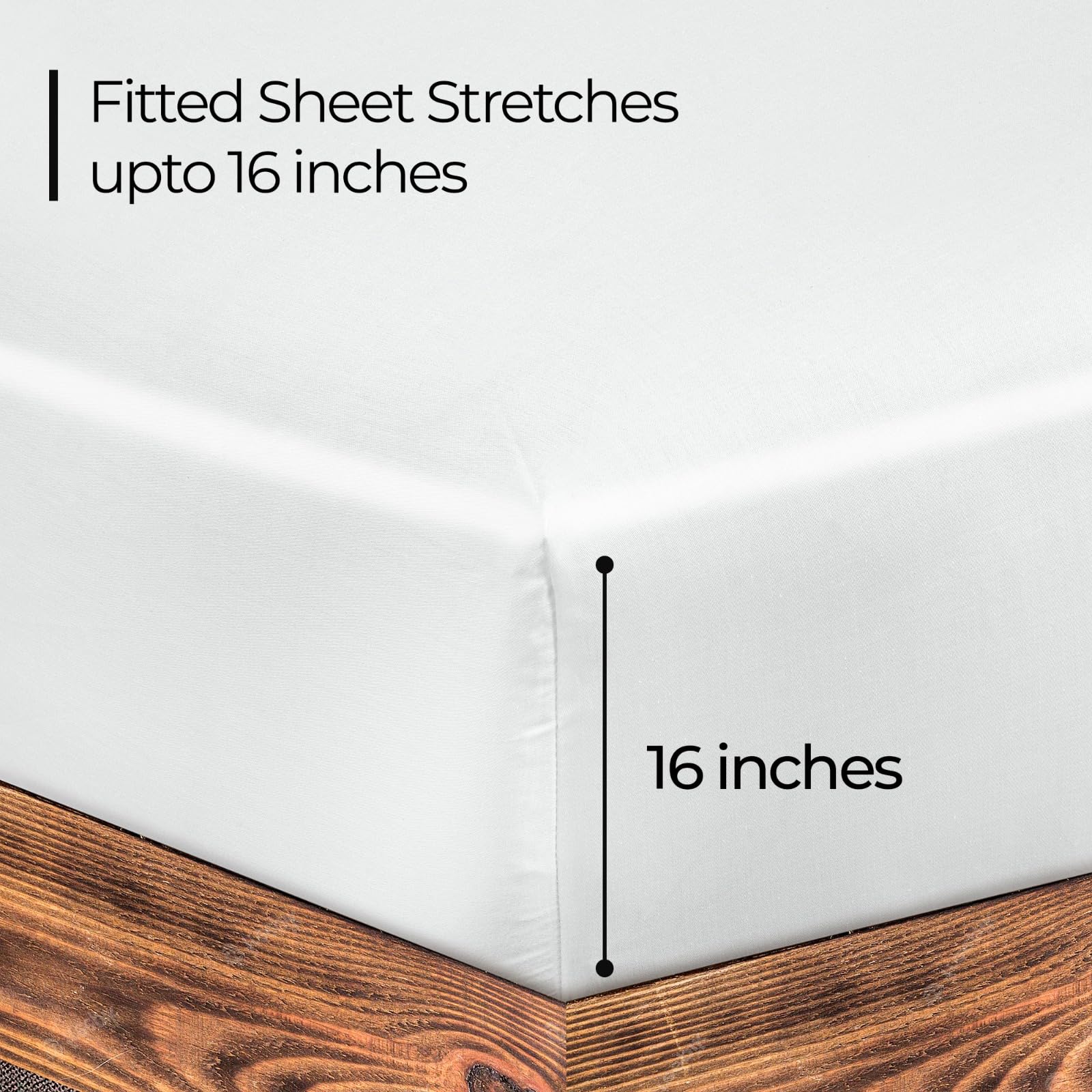 Royale Linens fitted sheet king white, side view, showing snug elastic edge for secure fit.