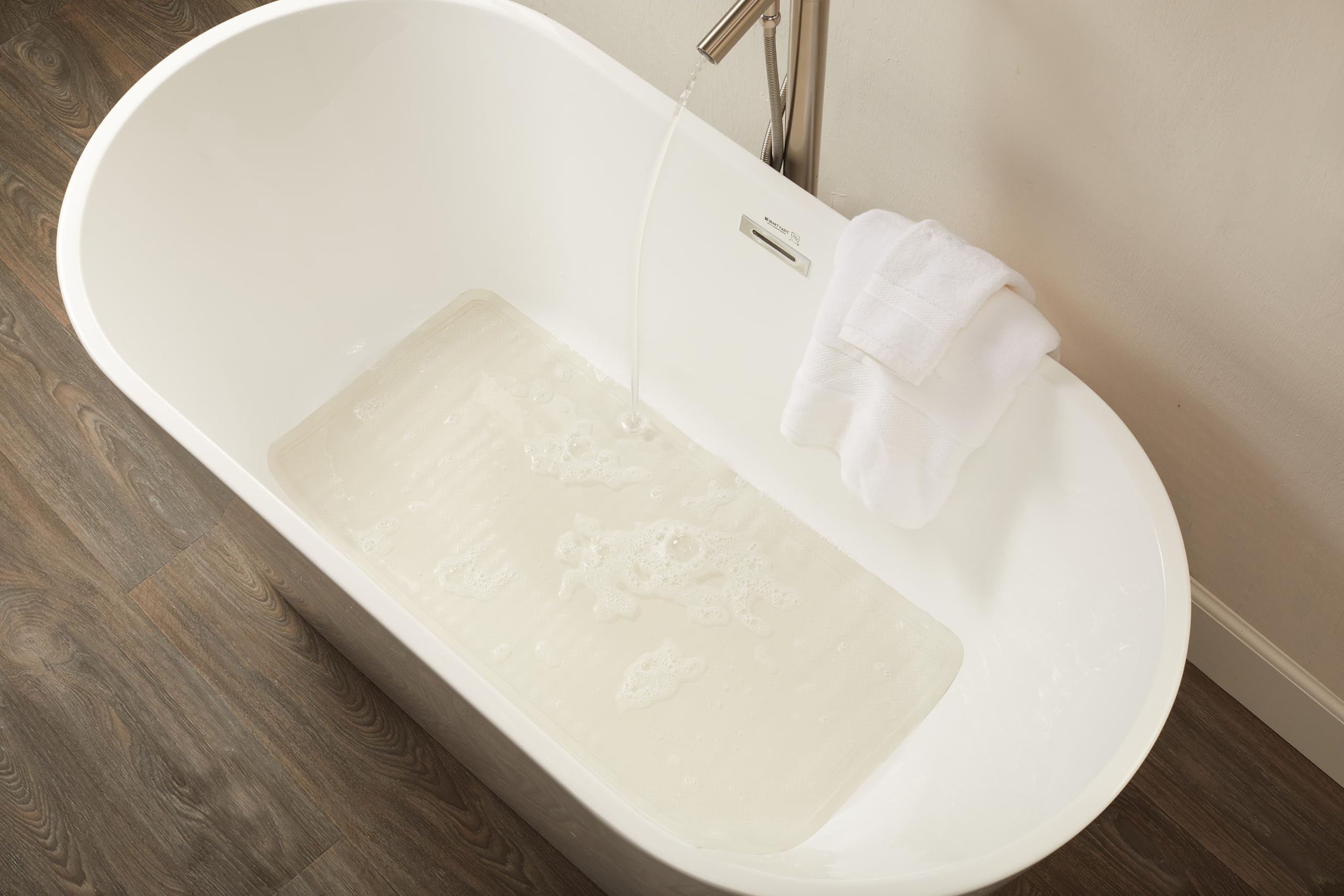 Rubbermaid mat showing textured surface to reduce slipping on wet floors.