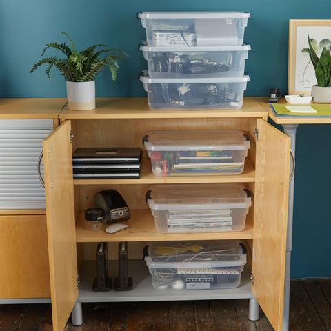 Rubbermaid Cleverstore bin handles secure items during transport.