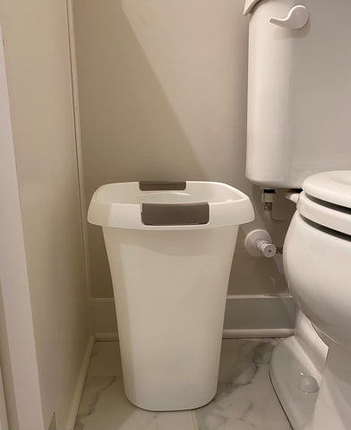Rubbermaid open-top trash can white office organization scene