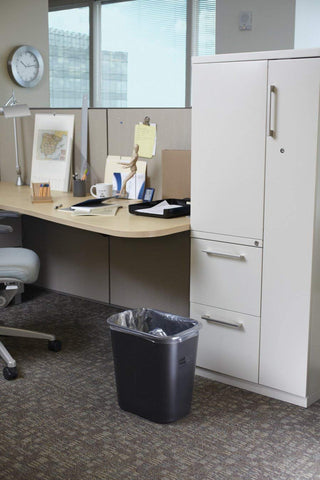 Rubbermaid wastebasket stacks neatly for transport and storage.
