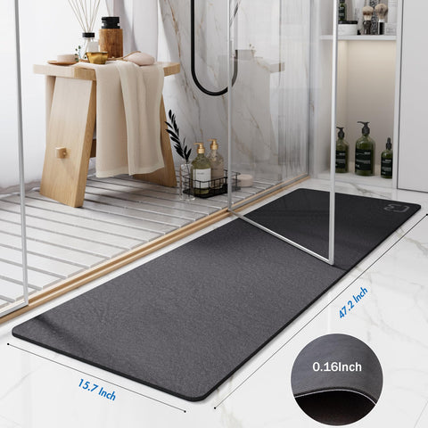 RUERYA dark grey bath mat diatomite surface shows fast water absorption.