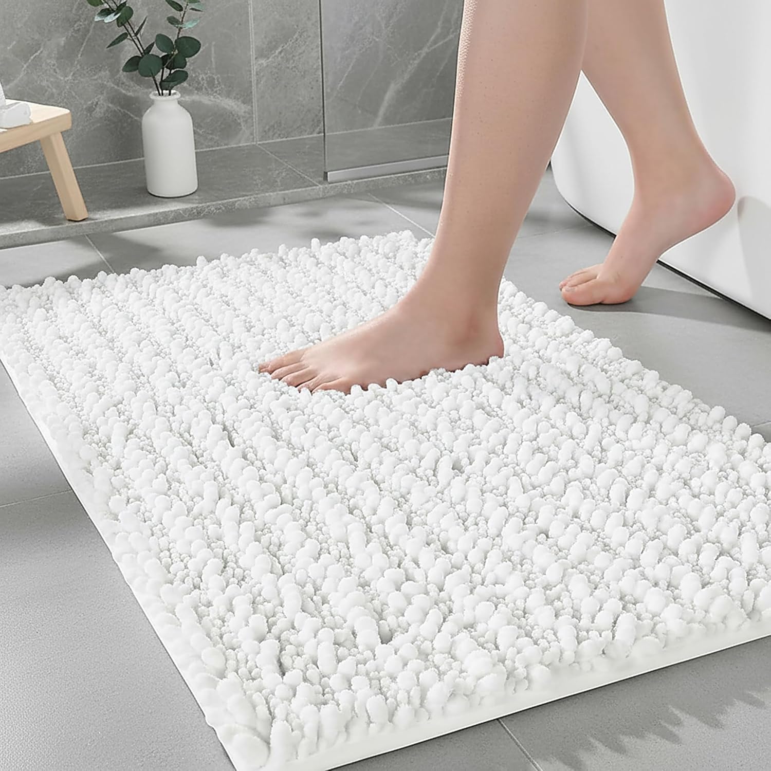 Ruggnovea bathroom rug with non-slip backing keeps floors dry and safe.