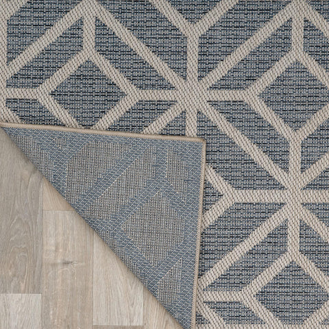 Rugshop Blue Durable polypropylene yarn conveys weather resistance for busy spaces.