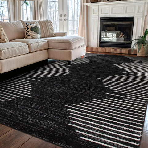 Rugshop Bohemian Stripe 5x7 Black rug in a living room setup, showcasing bold colors and durability.