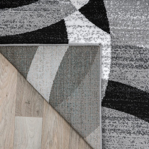 Rugshop High-traffic-ready rug reduces wear and maintains a neat appearance.