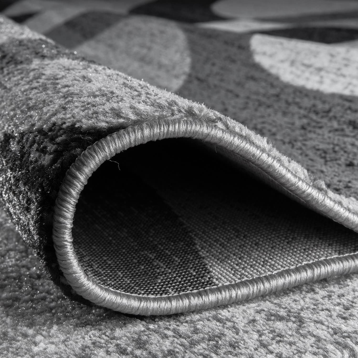 Rugshop Dense plush texture feels soft underfoot for everyday living spaces.