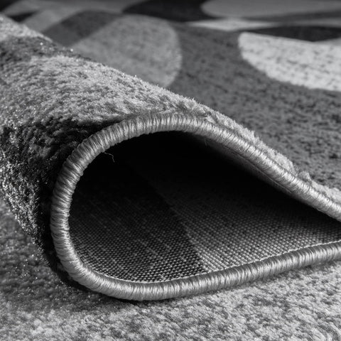 Rugshop Dense plush texture feels soft underfoot for everyday living spaces.