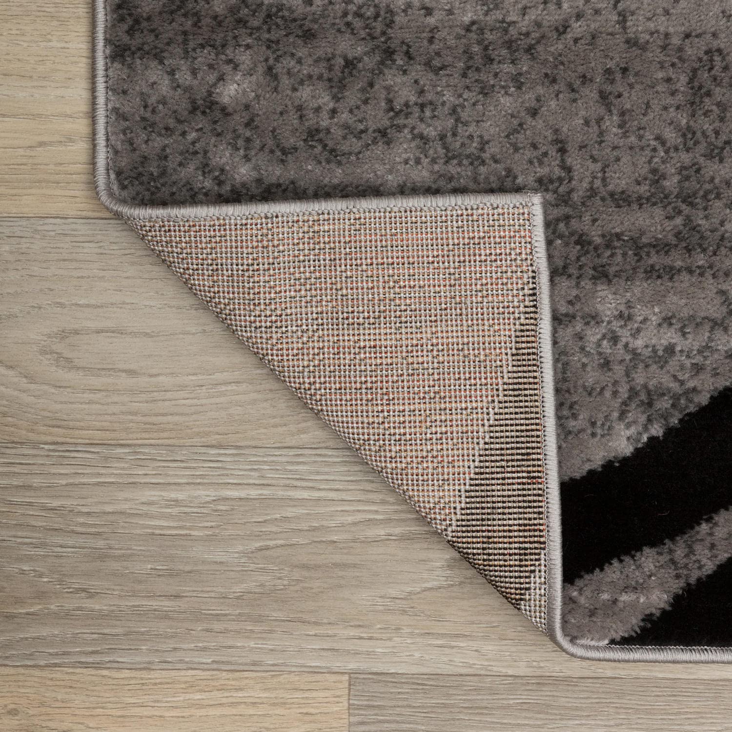 Rugshop Wavy Circles back with jute backing for stability.