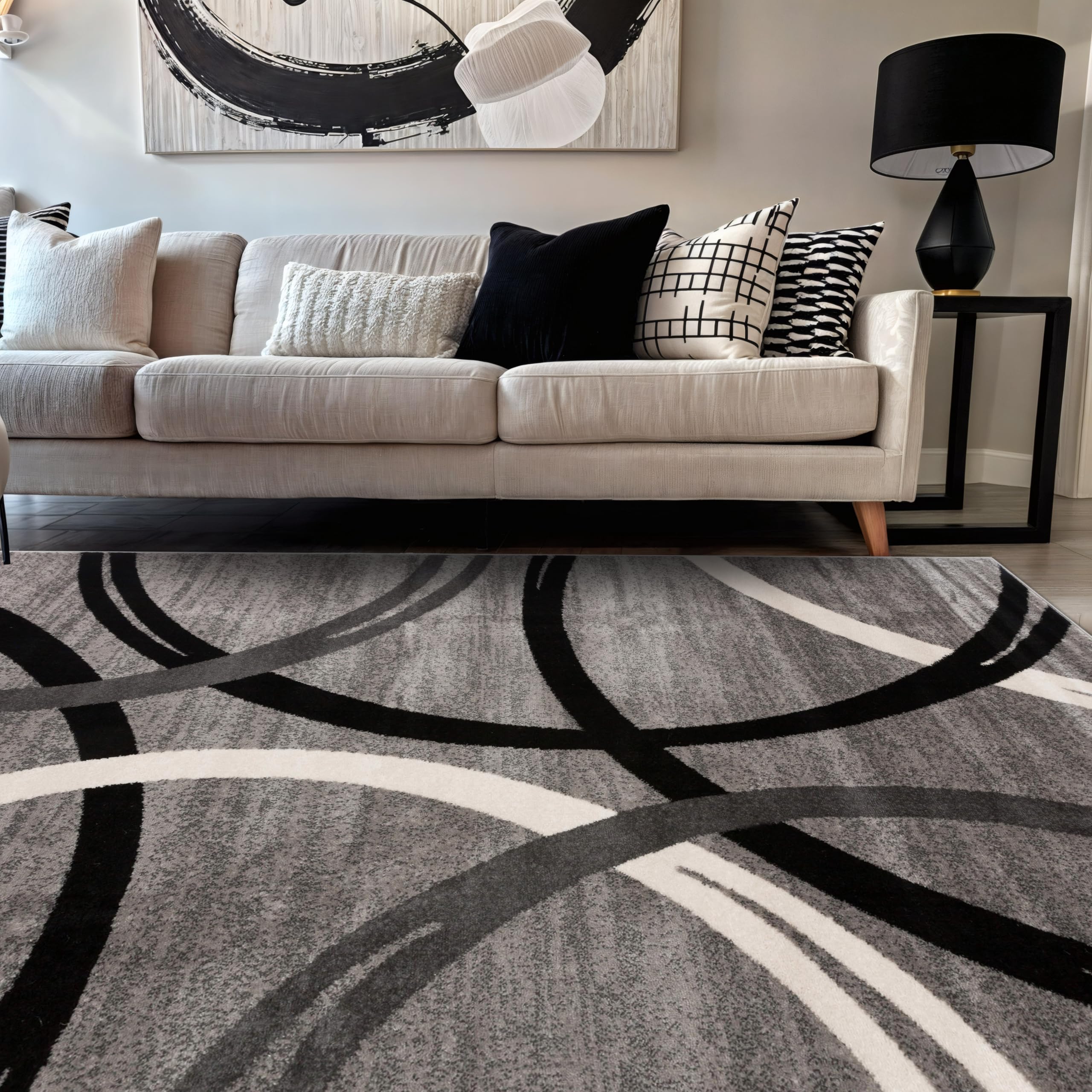 Rugshop Wavy Circles gray rug highlights bold living room design.