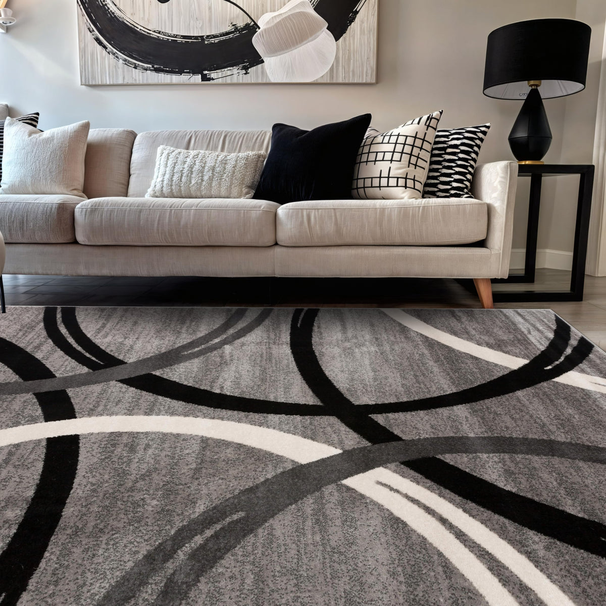 Rugshop Wavy Circles gray rug highlights bold living room design.
