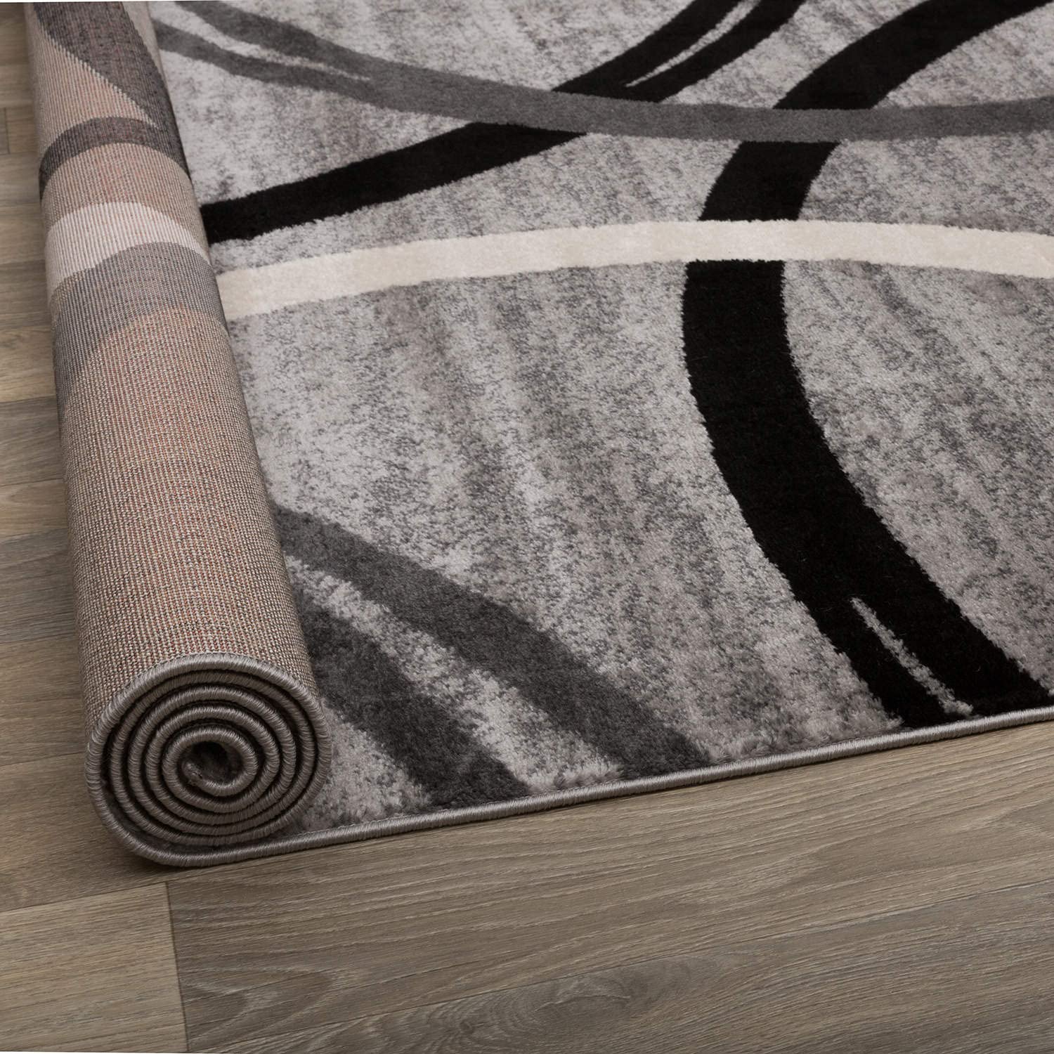 Rugshop Wavy Circles gray rug complements dining room setups.